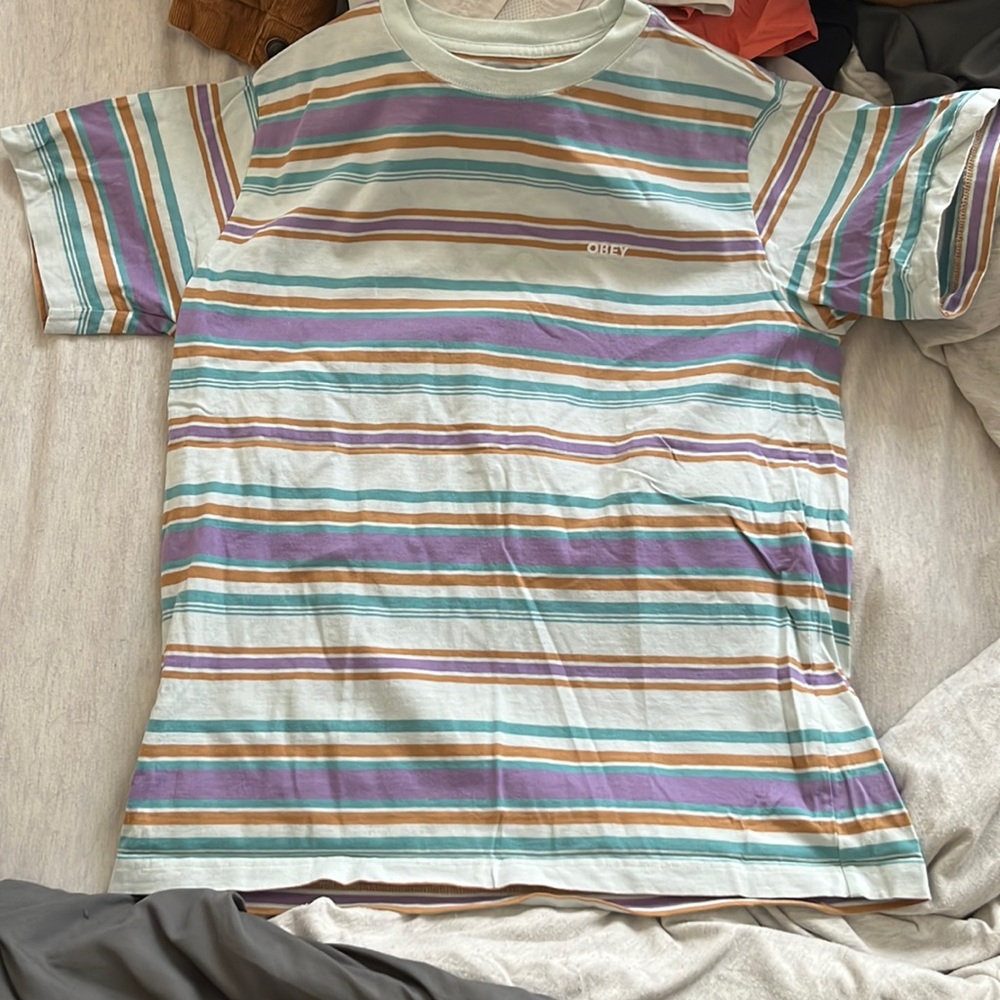 Multi color striped Obey shirt. Medium